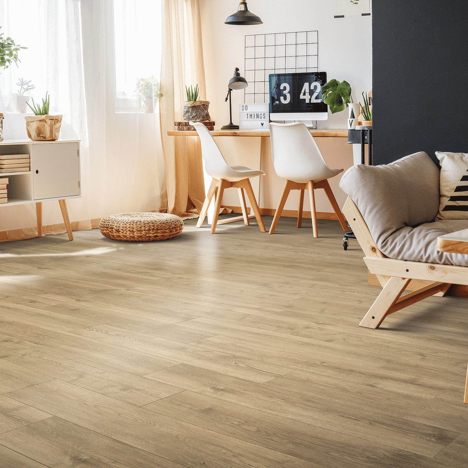 A living room with wooden floors and furniture.