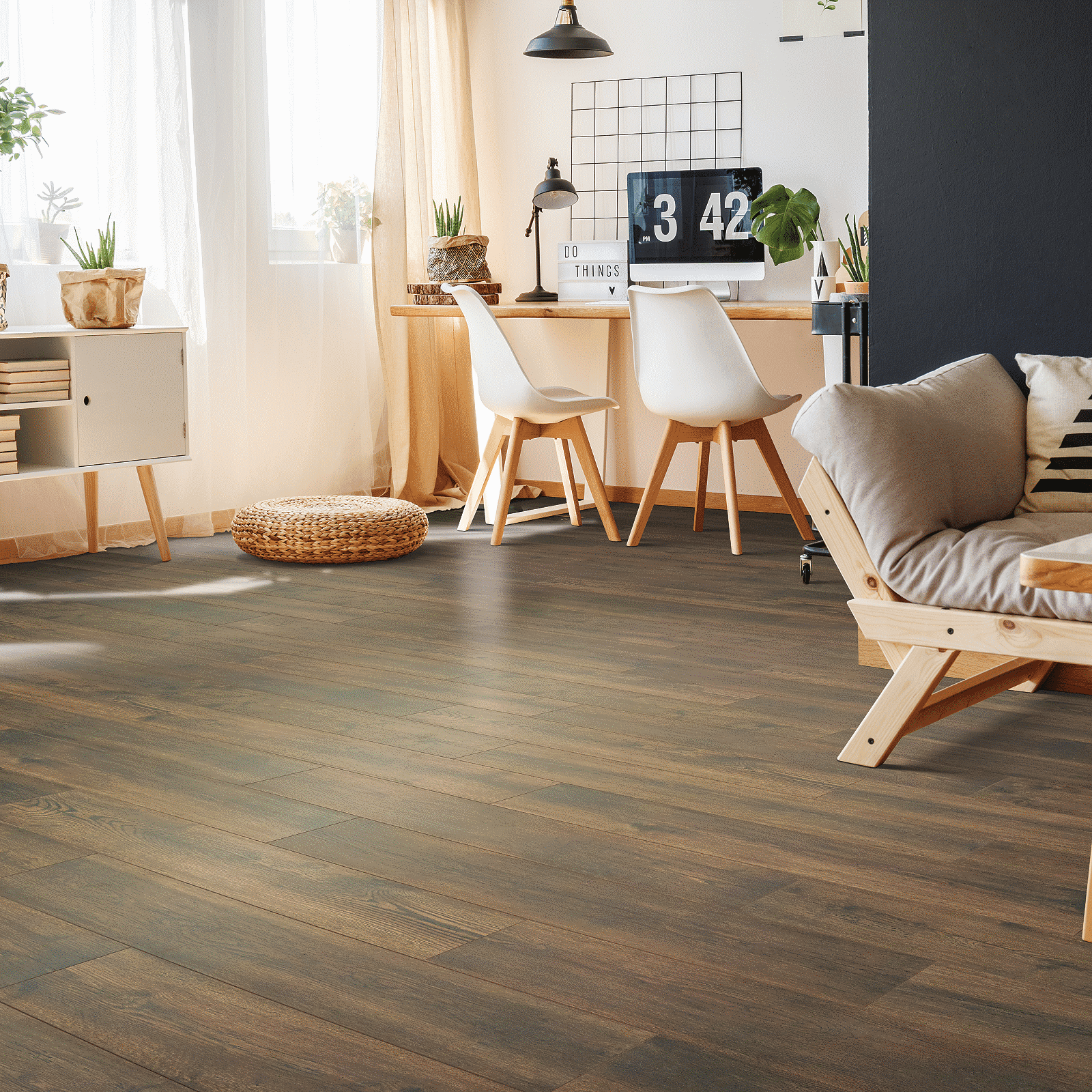 A living room with wooden floors and furniture.