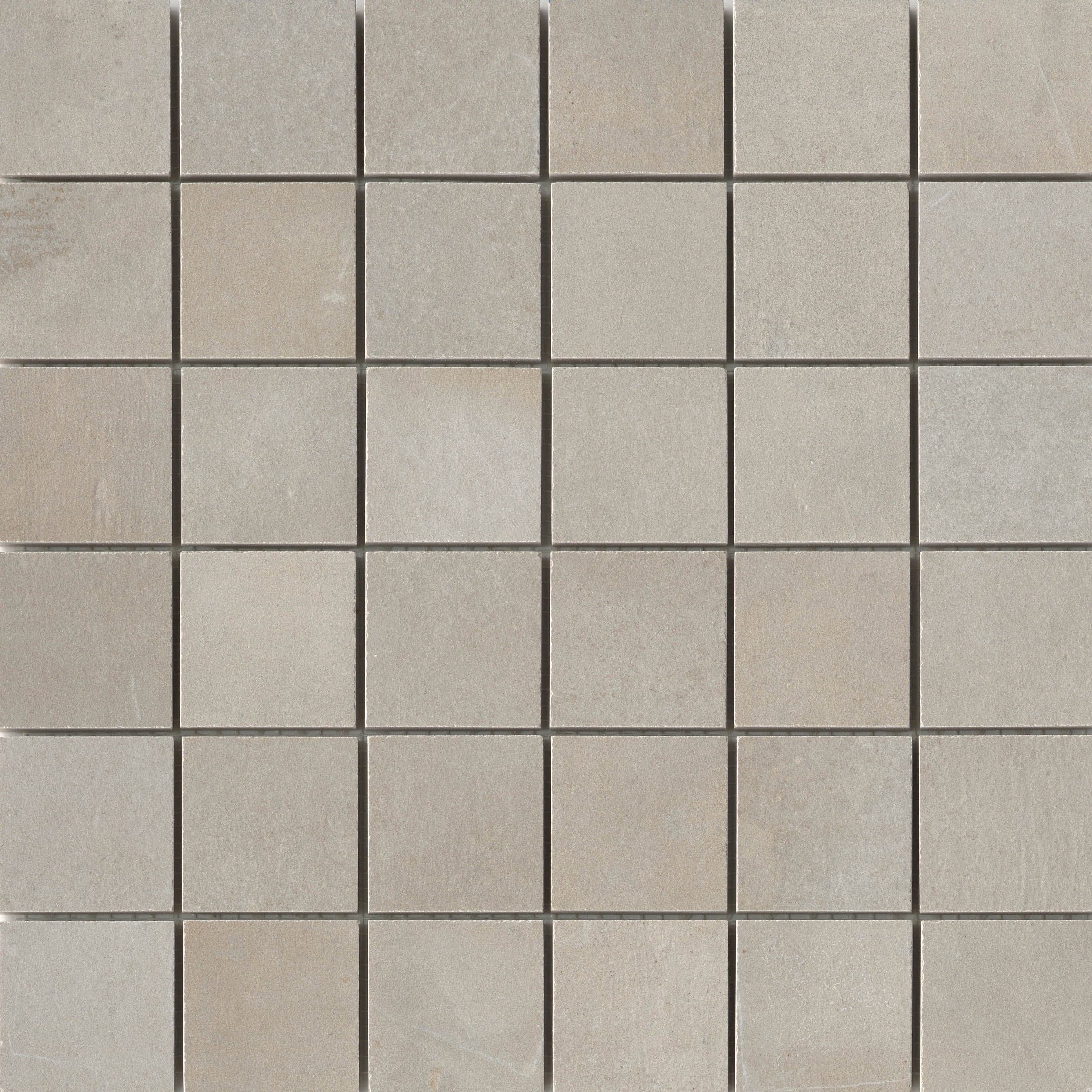 A close up of the tile surface of a floor