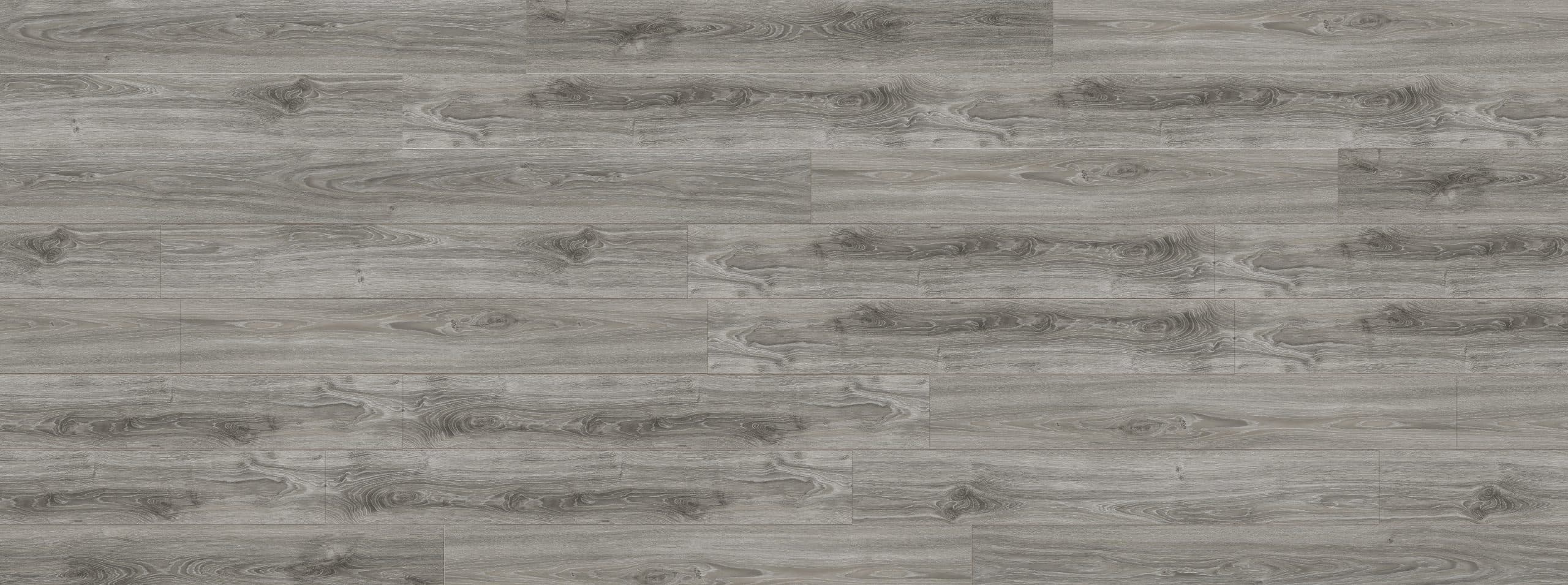 A gray wood floor with some type of wood grain