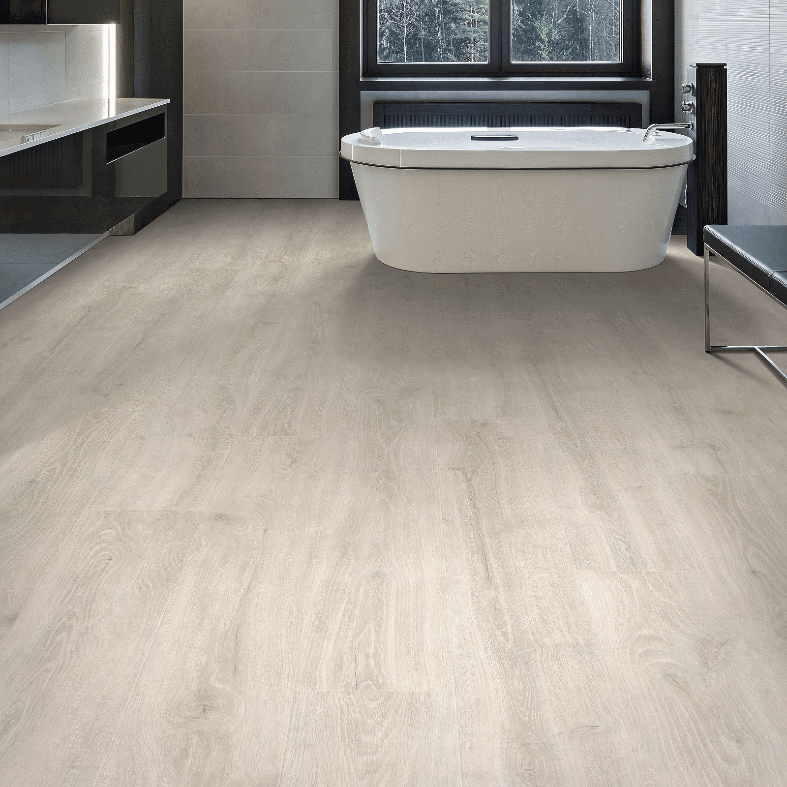 A bathroom with white walls and floors.