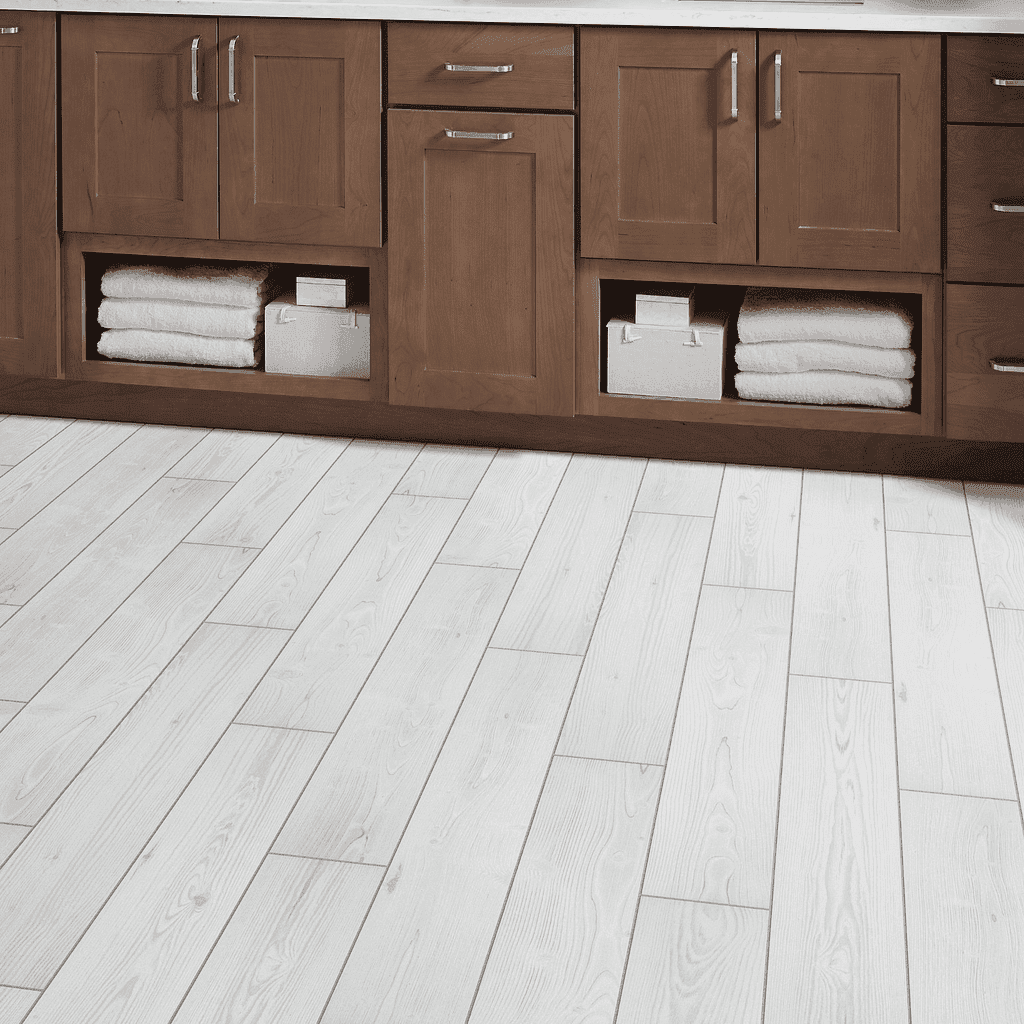 A white floor with brown cabinets and drawers.