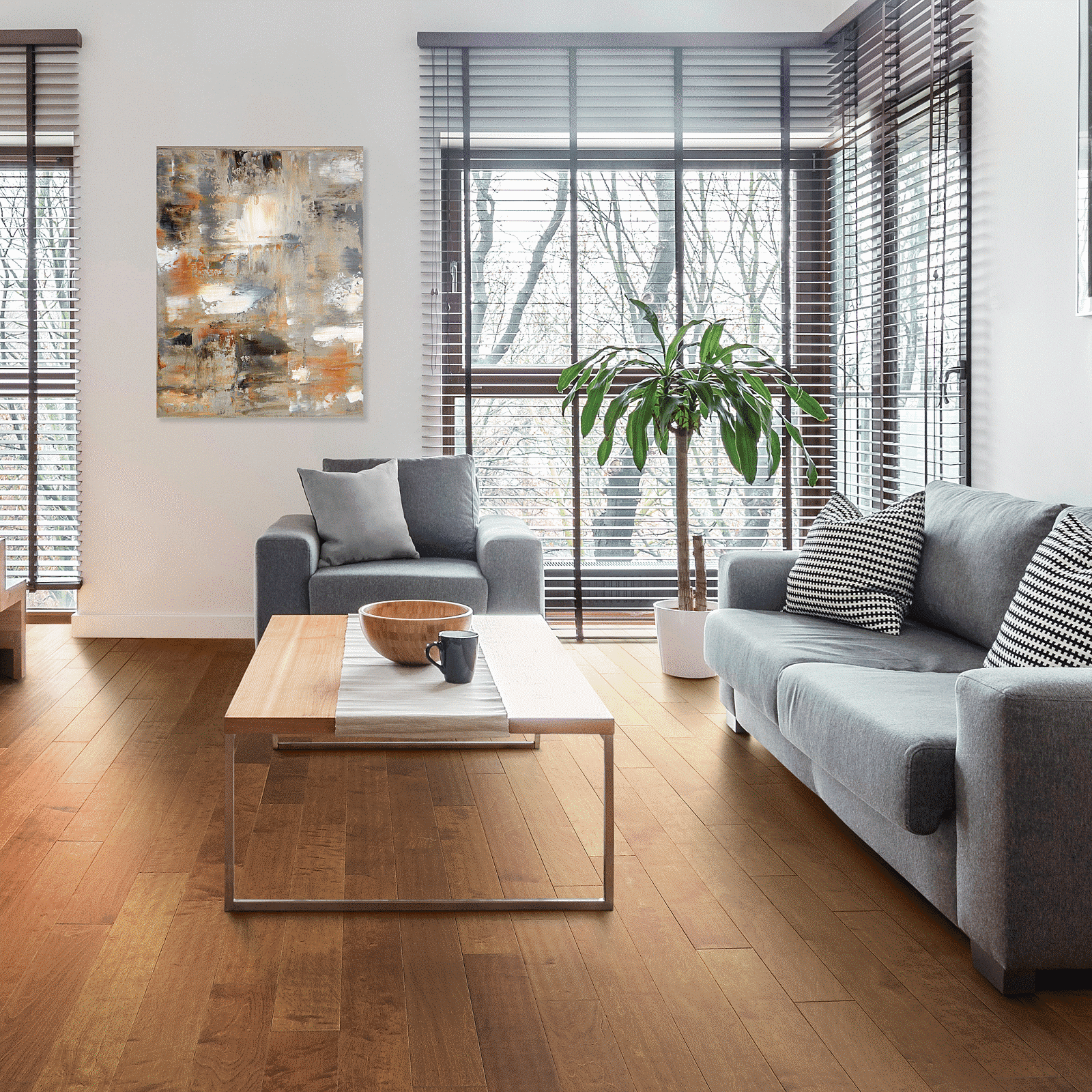 A living room with wooden floors and furniture.