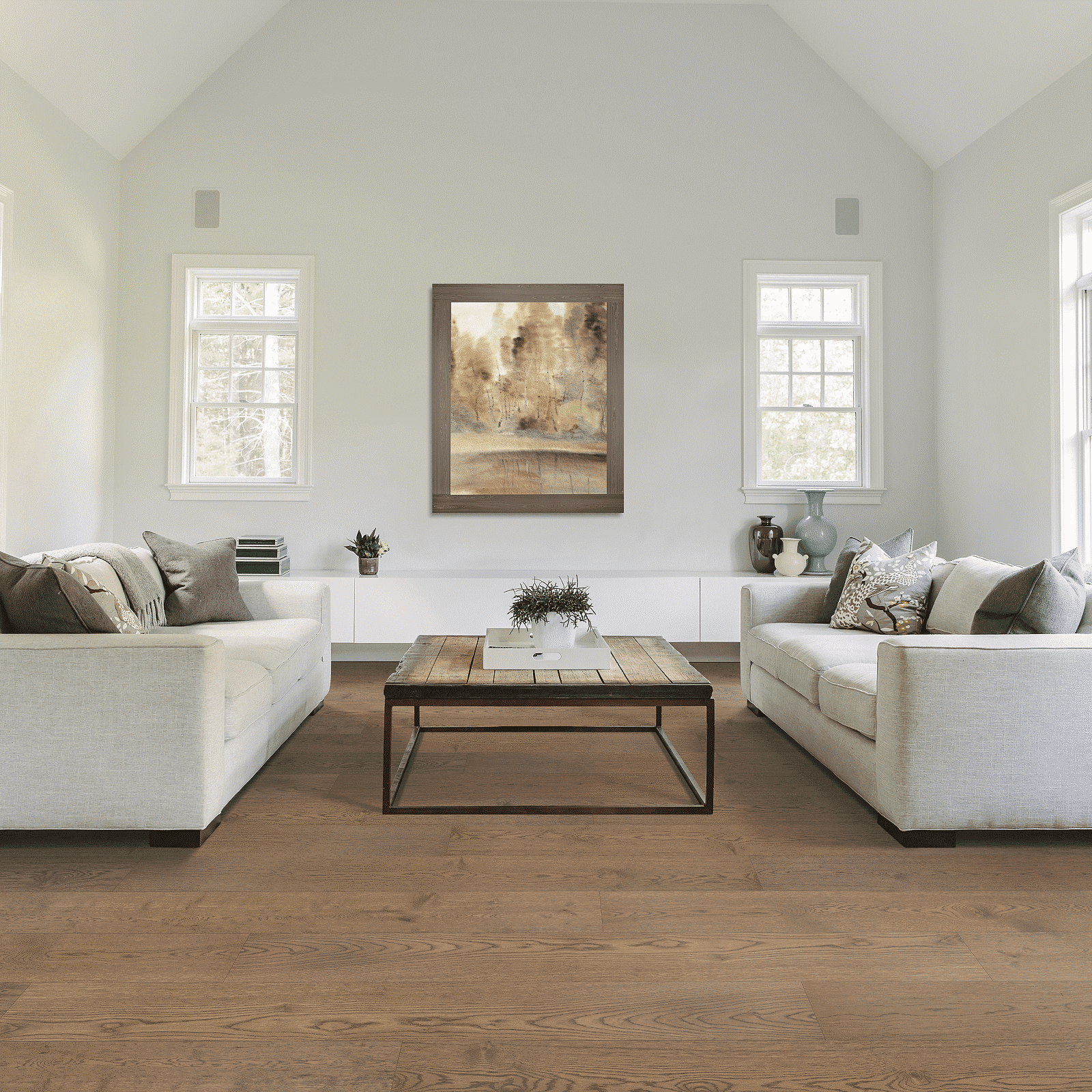 A living room with couches and tables in it