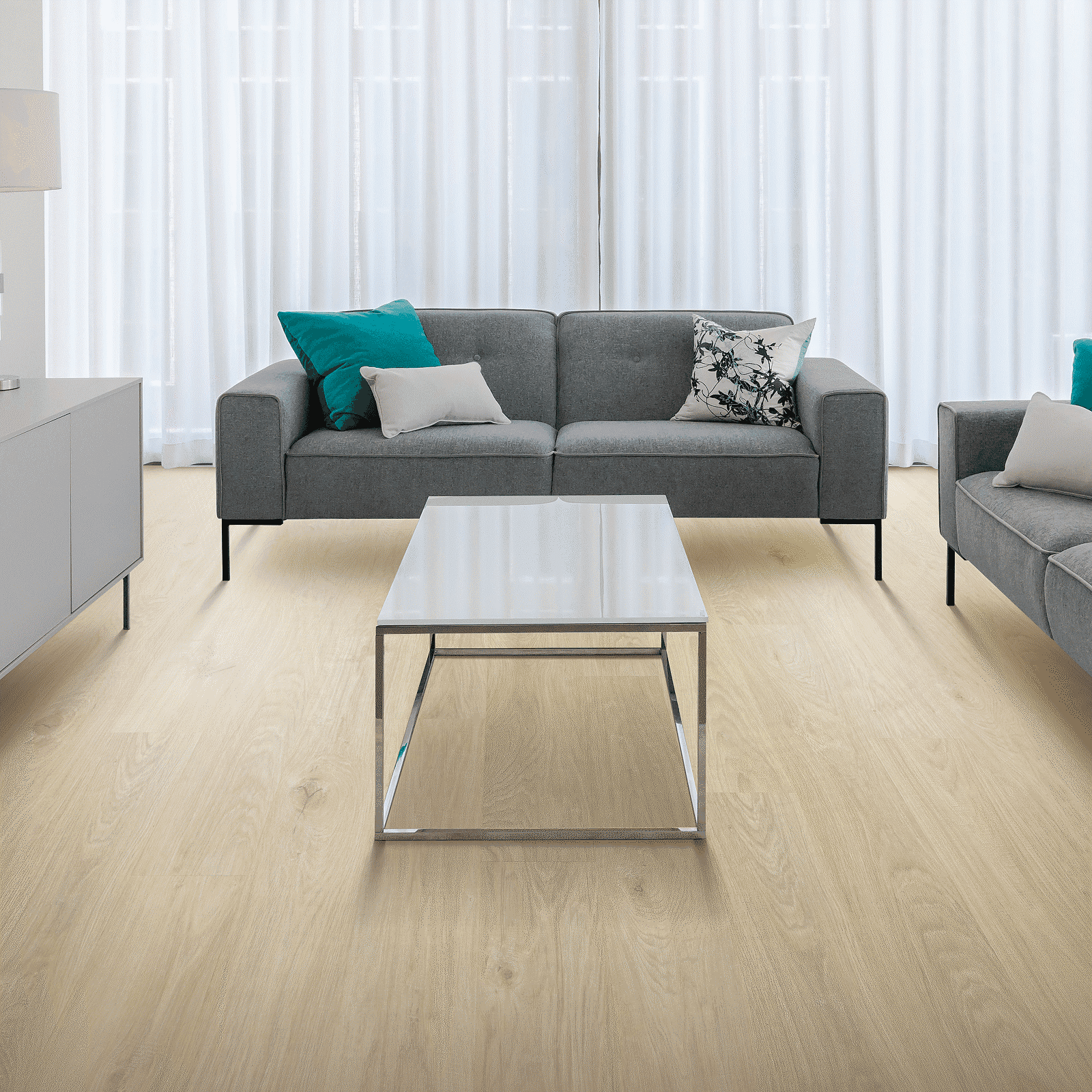 A living room with couches and tables in it