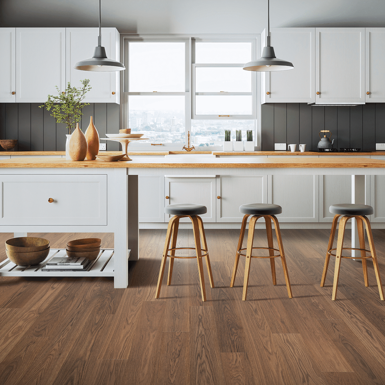 A kitchen with wooden floors and white cabinets.