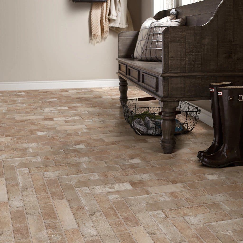 A room with a bench and a chair