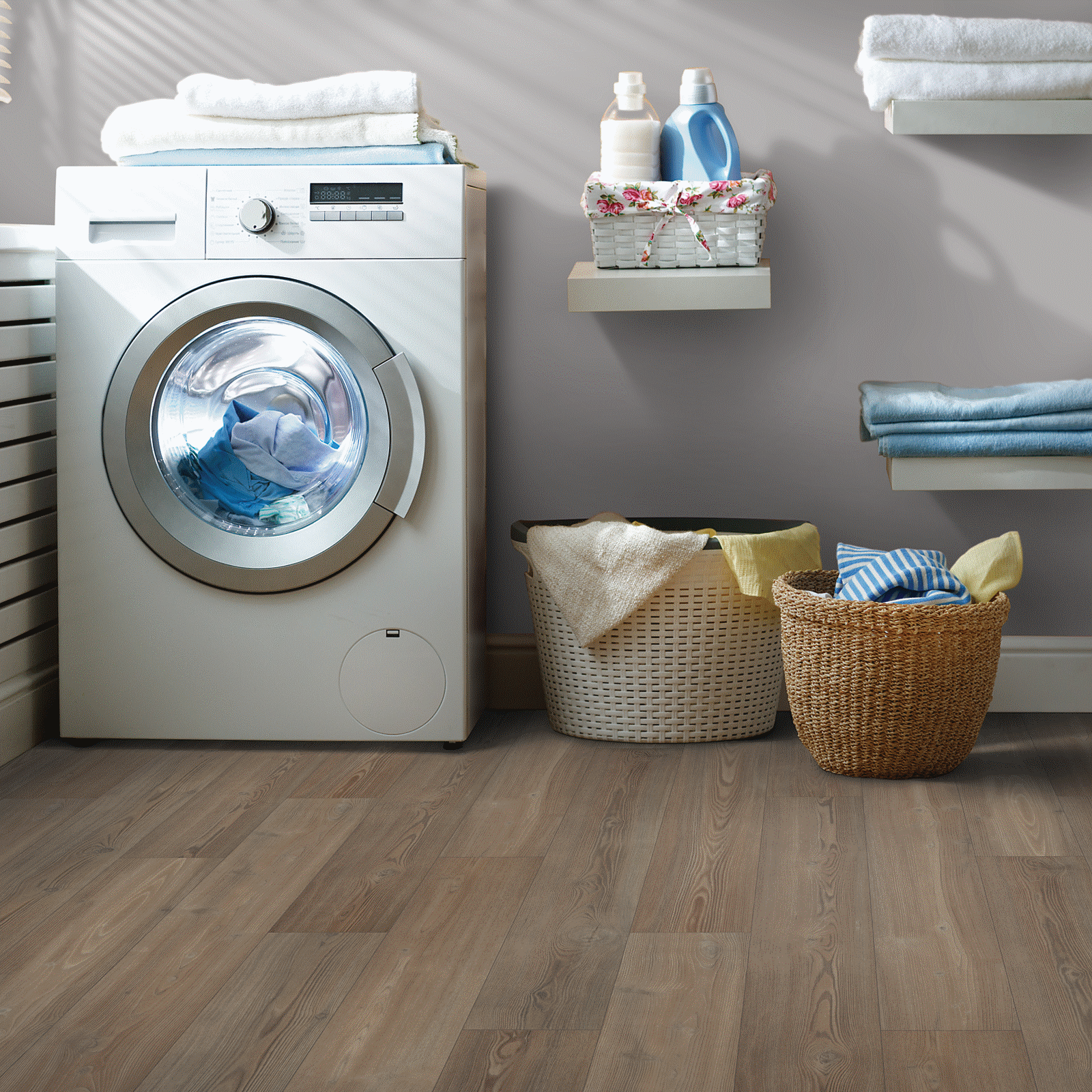A laundry room with a washer and dryer.