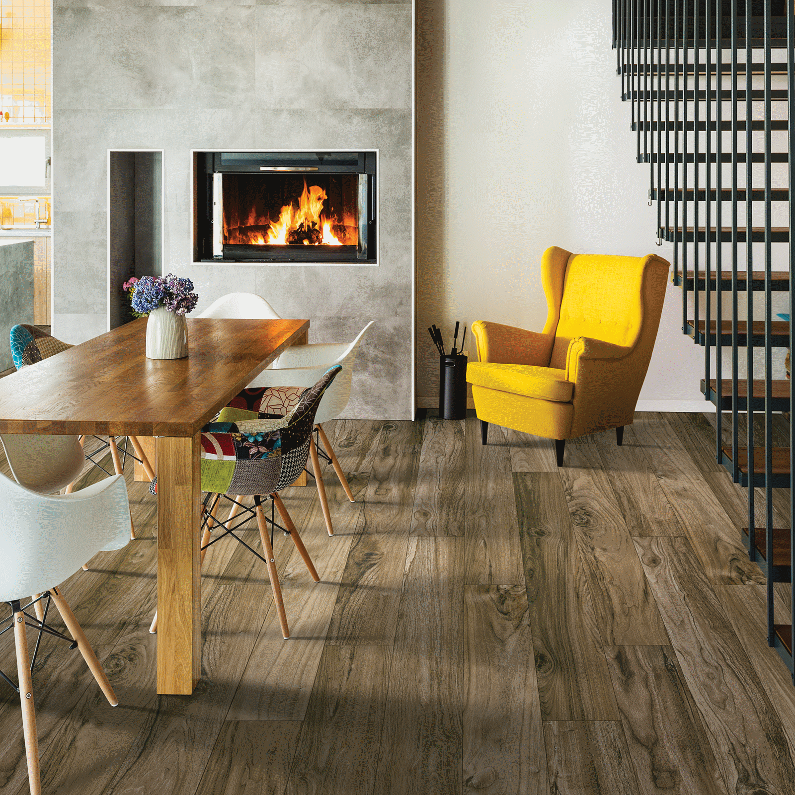 A dining room with a fireplace and a table