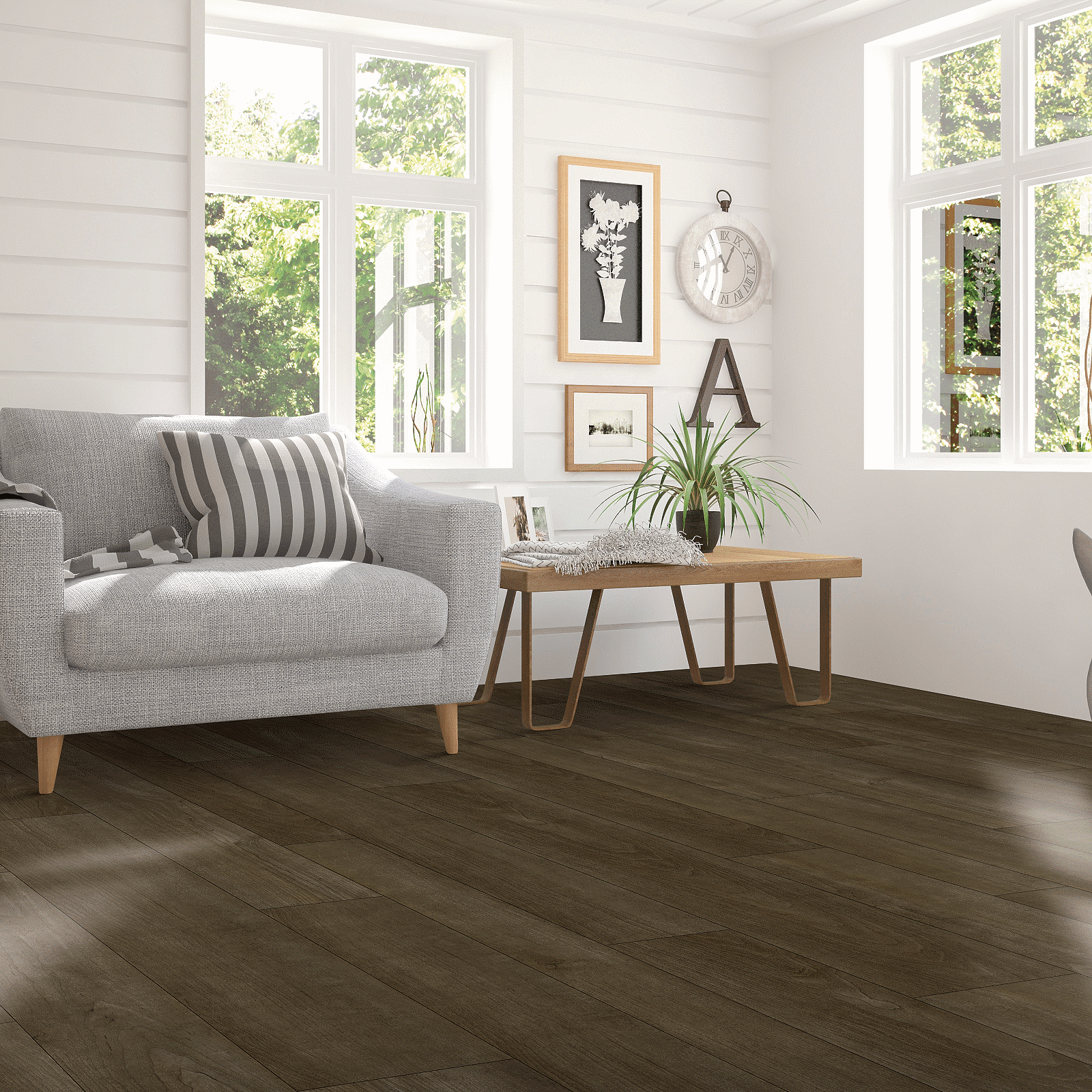 A living room with white furniture and wood floors.