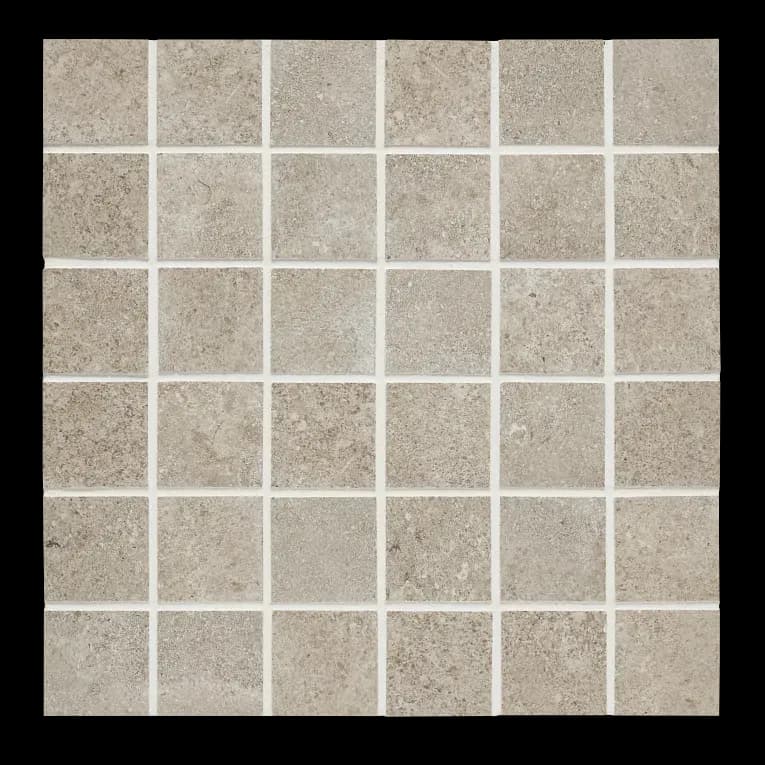A close up of the tile surface of a bathroom floor