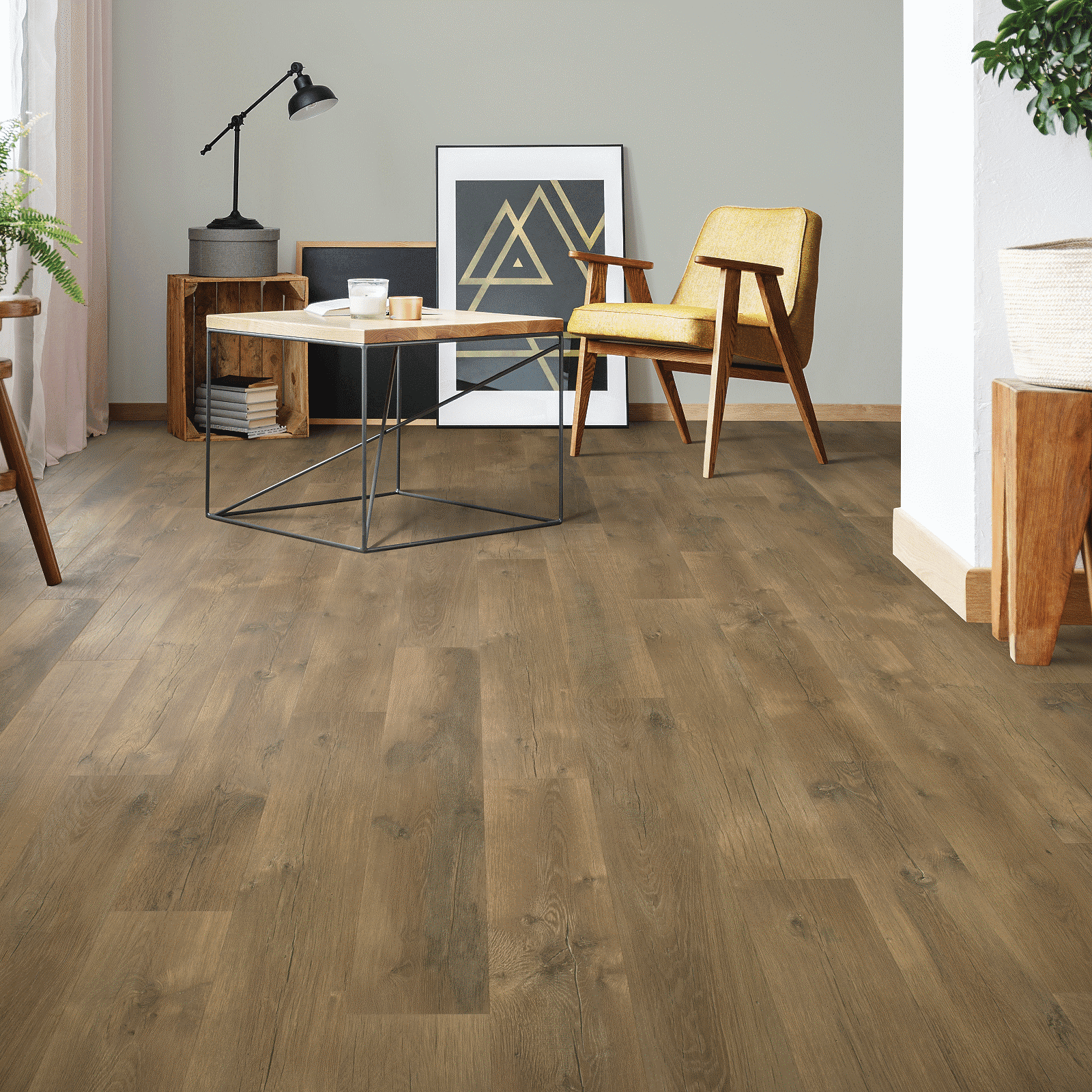 A living room with hard wood floors and furniture.