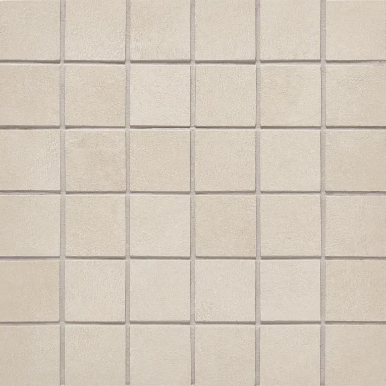 A close up of the tile surface of a bathroom floor