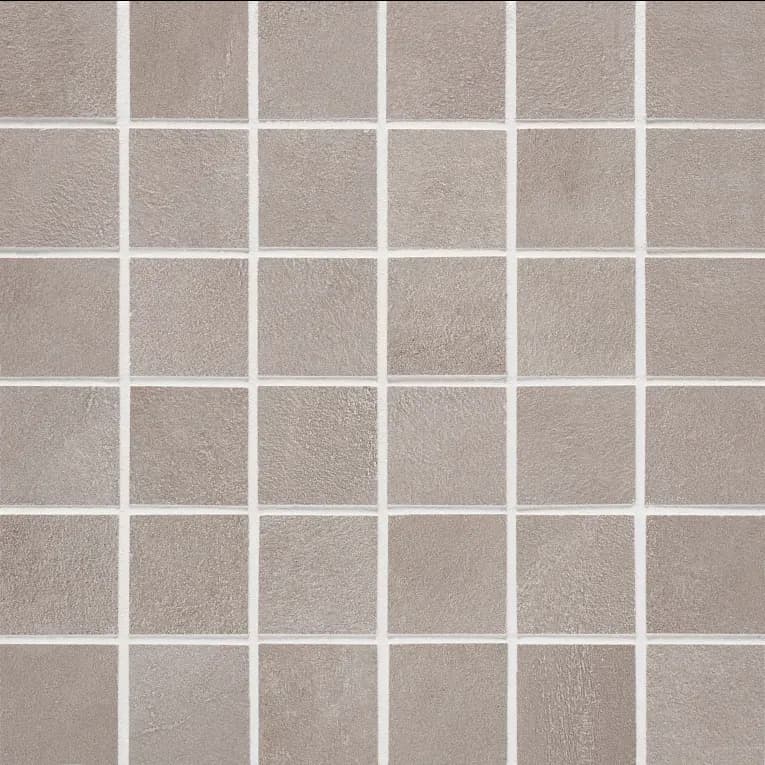 A close up of the tile surface of a bathroom floor