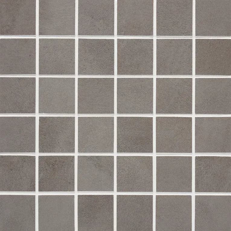 A close up of the tile surface of a bathroom floor