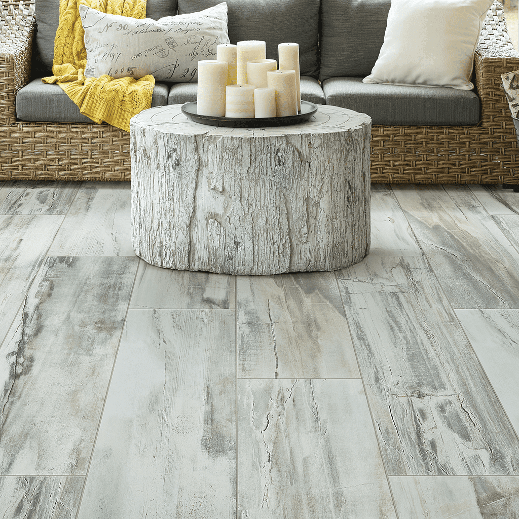 A patio with a couch and table in it