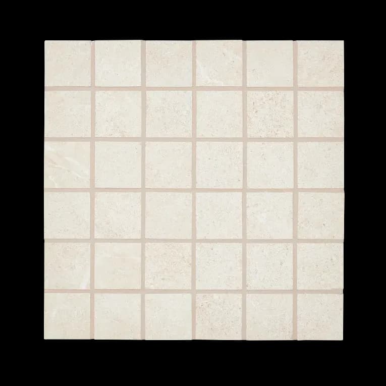 A white tile floor with some small squares