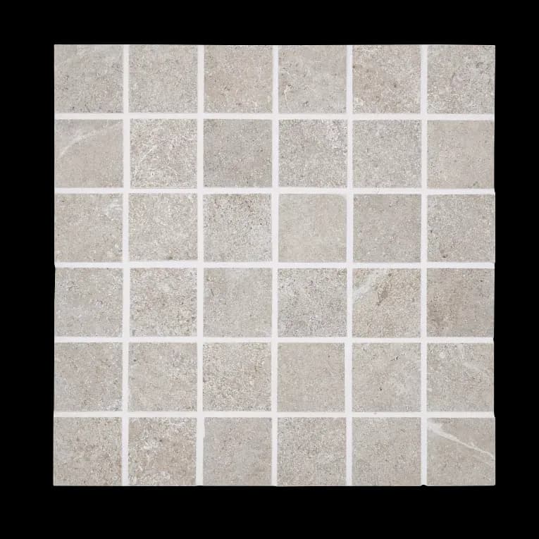 A white tile floor with some small squares