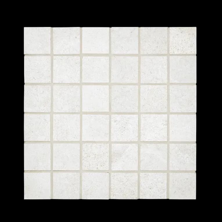 A white tile floor with no grout.