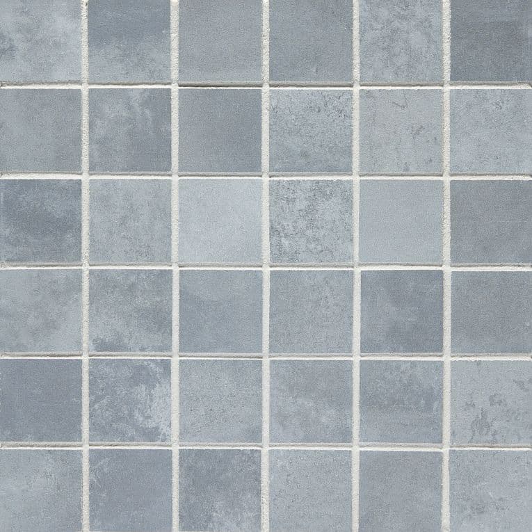 A close up of the tile pattern in a bathroom