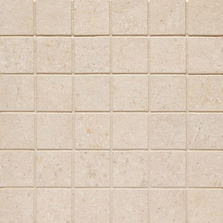 A close up of the tile pattern on the wall.