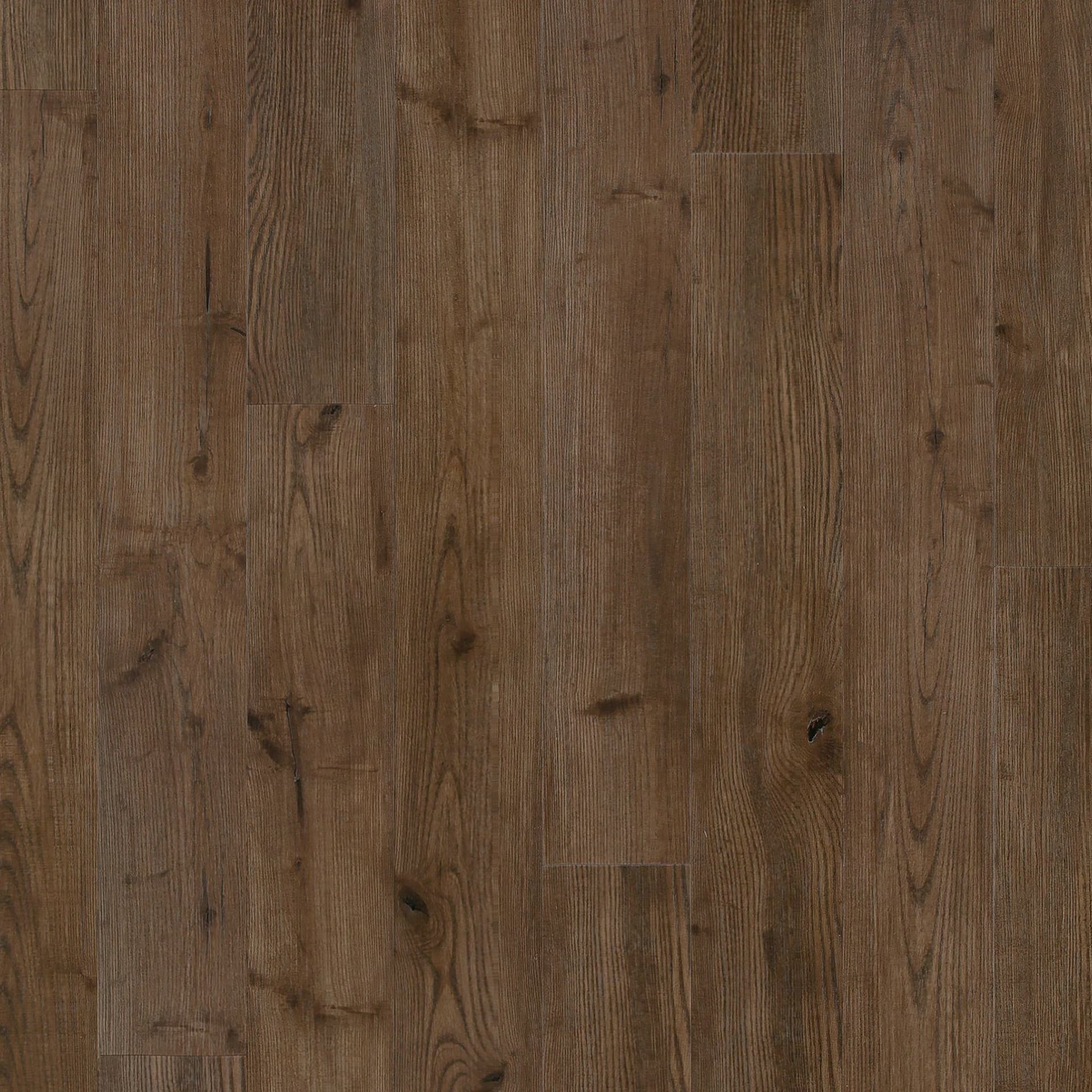 A close up of the wood grain on the floor.