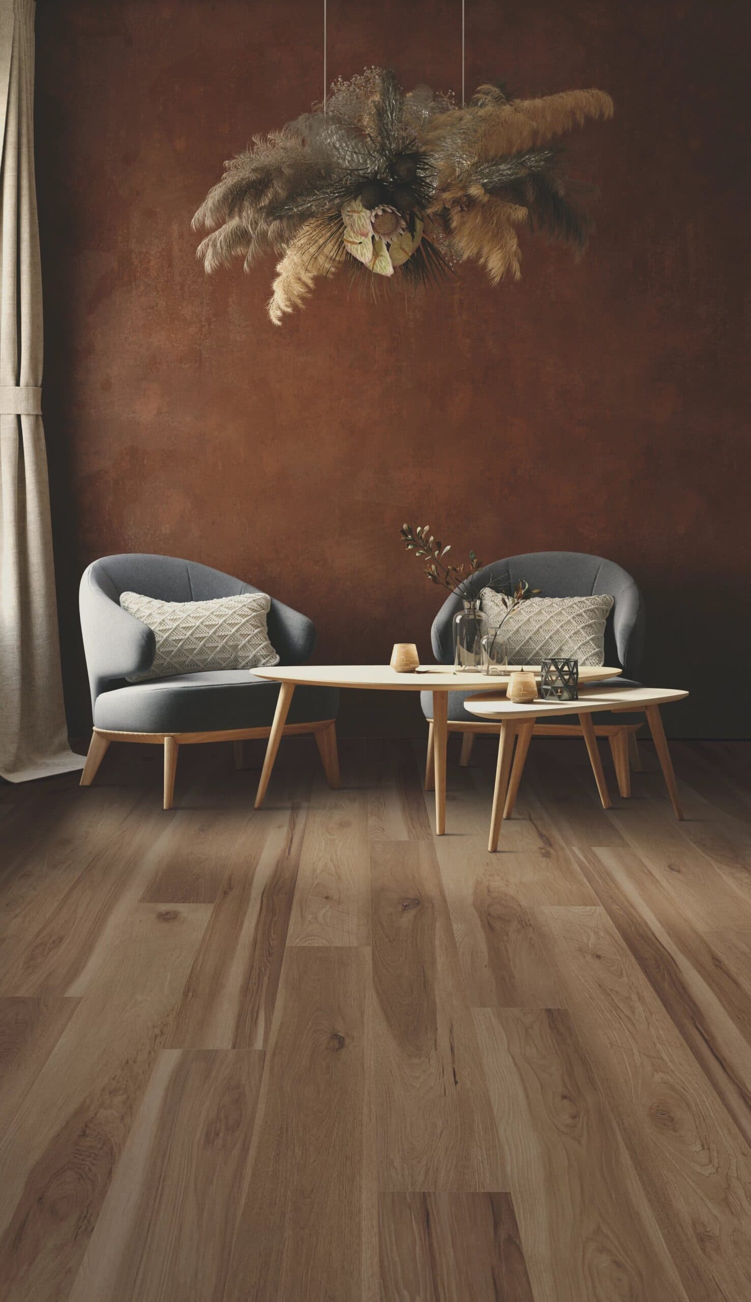 Two chairs and a table in front of a wall.