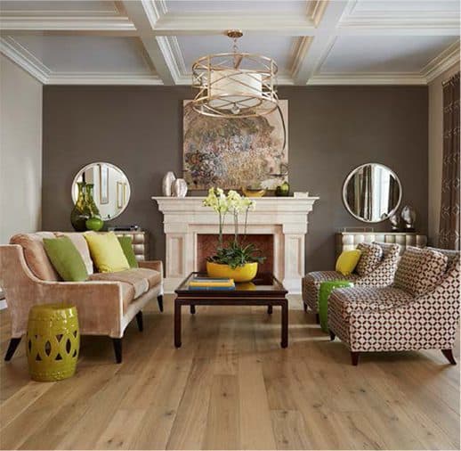 A living room with wooden floors and furniture