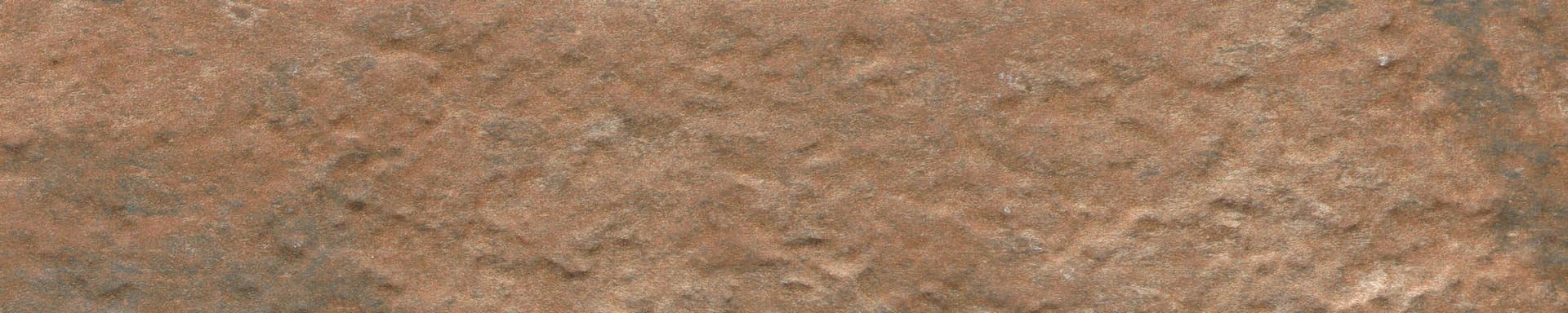 A close up of the sand on the beach