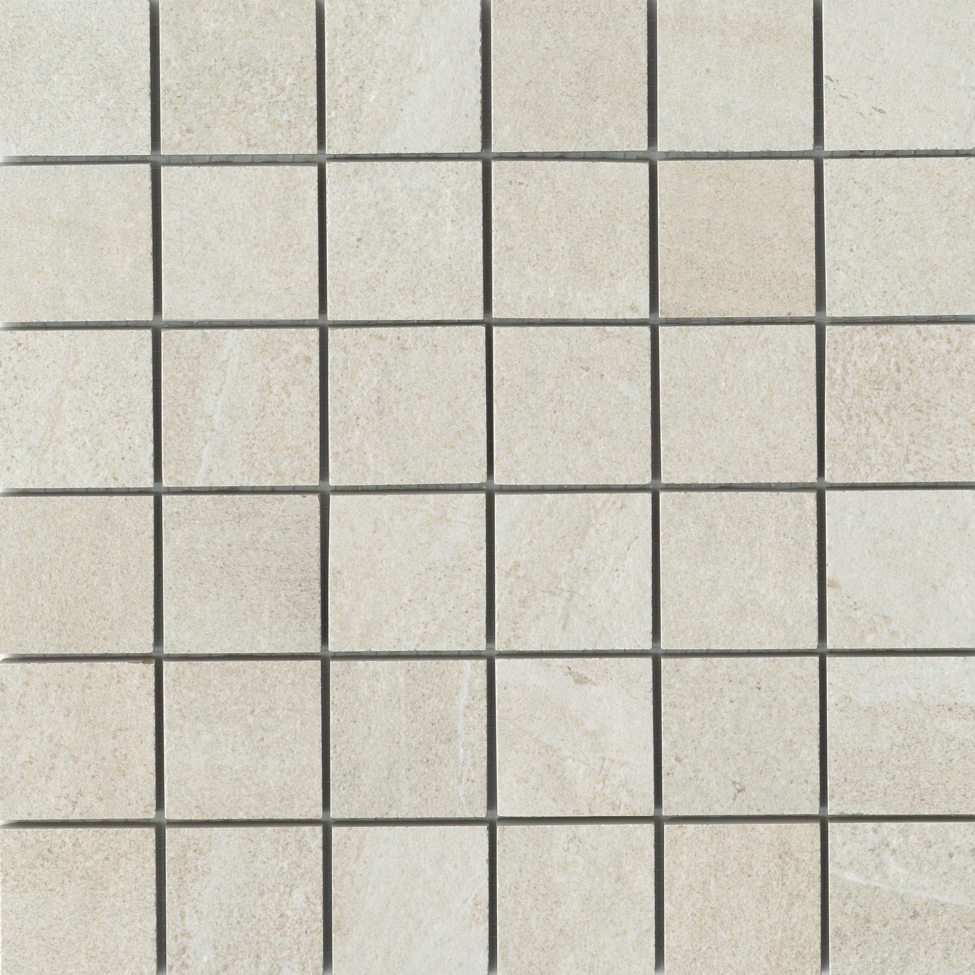 A close up of the tile surface of a floor