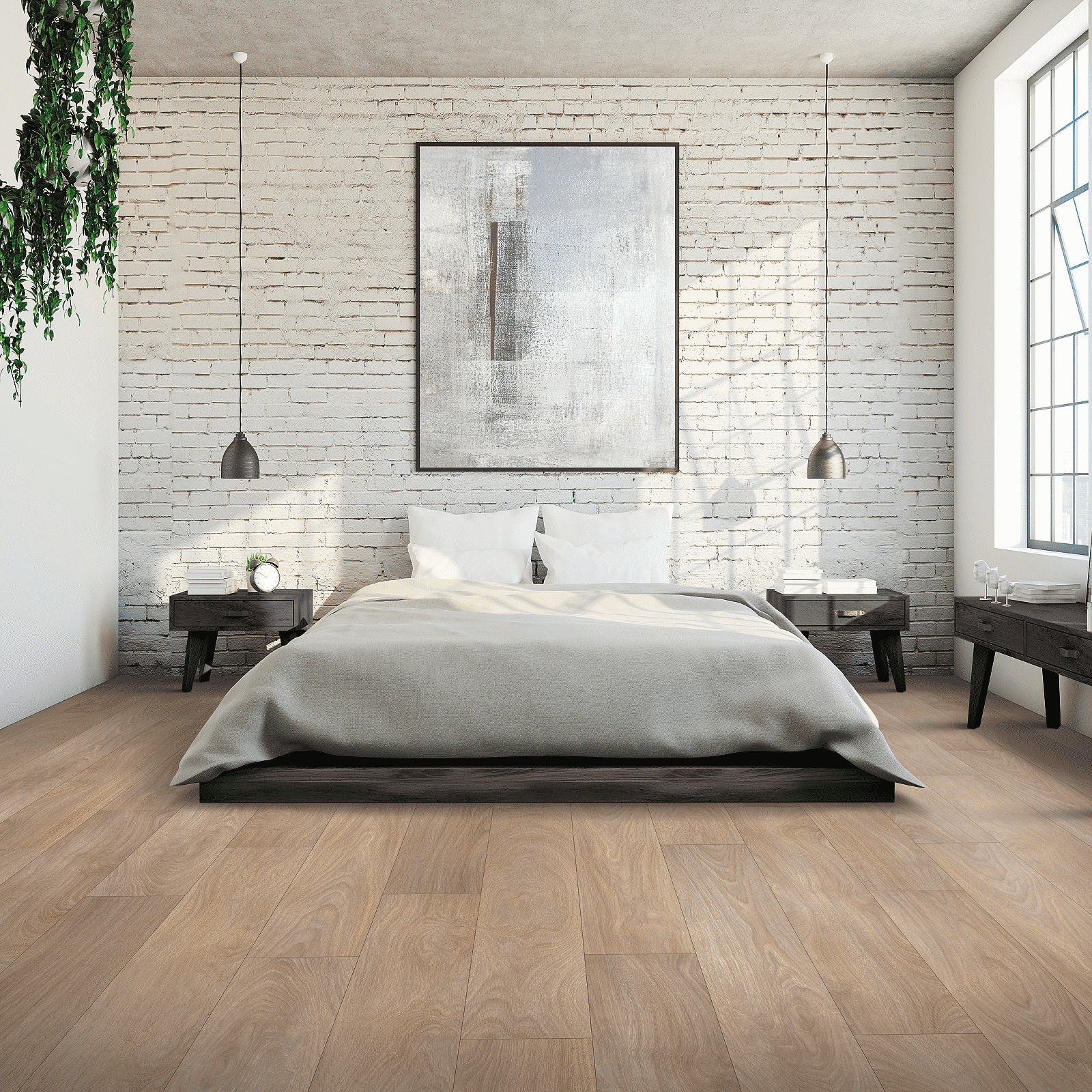 A bedroom with a bed and two lamps.