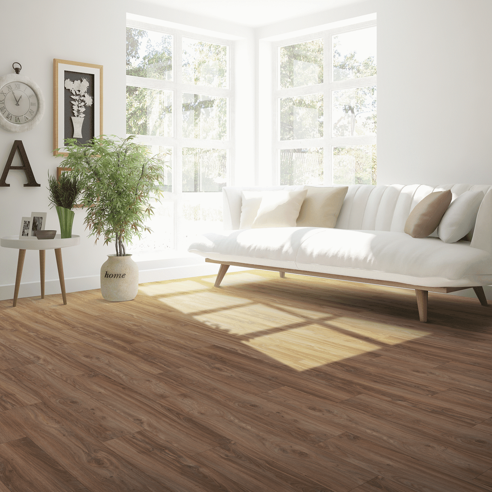 A living room with white furniture and wooden floors.