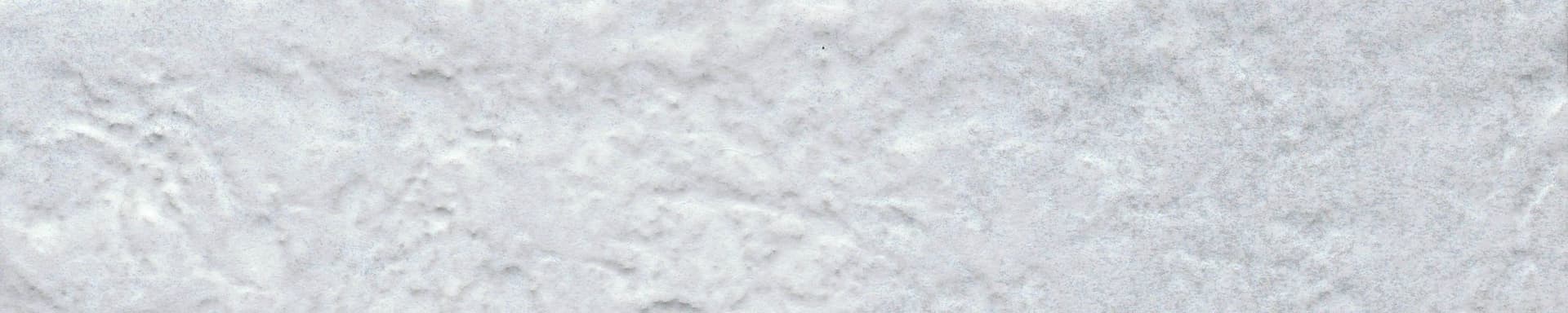 A white background with some type of substance on it