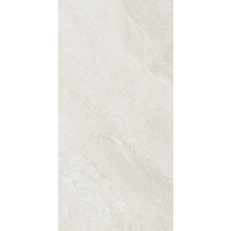 A white tile floor with some type of stone