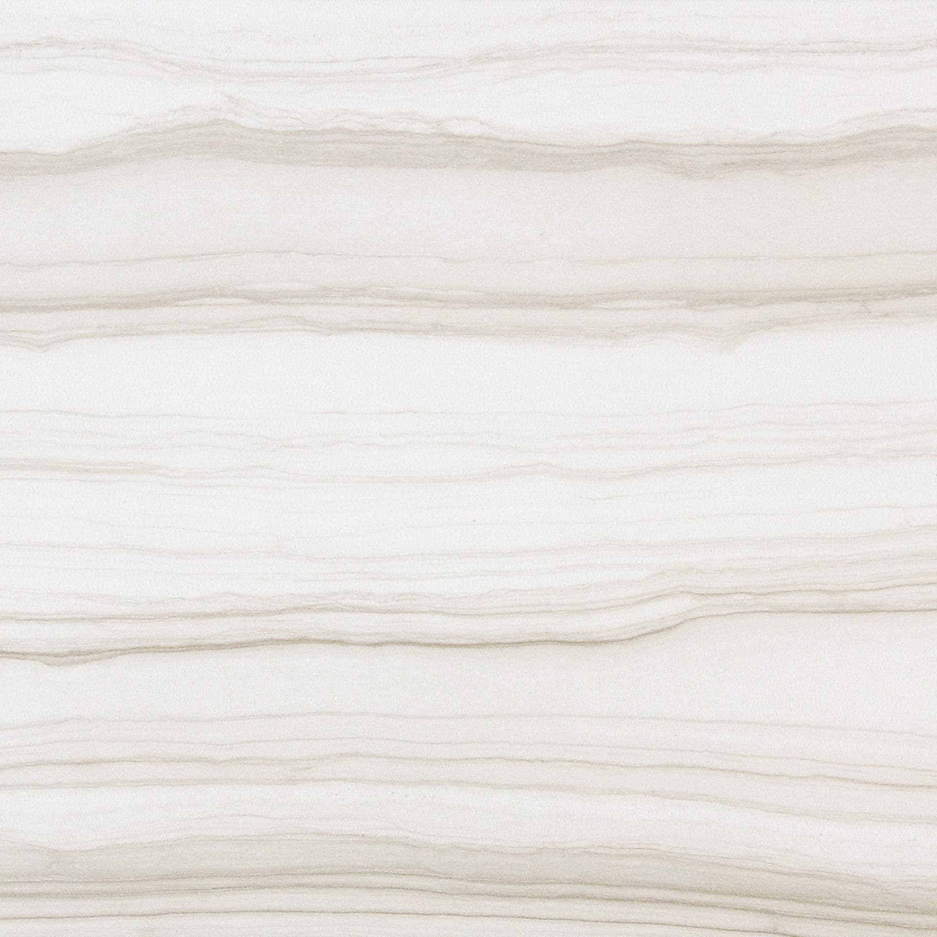 A white marble surface with some very thick lines.