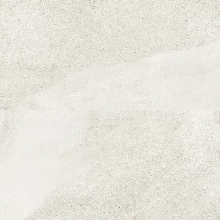 A white marble floor with some light colored stones