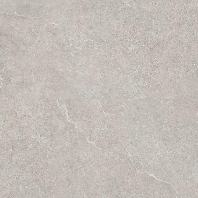 A white marble surface with some small bubbles