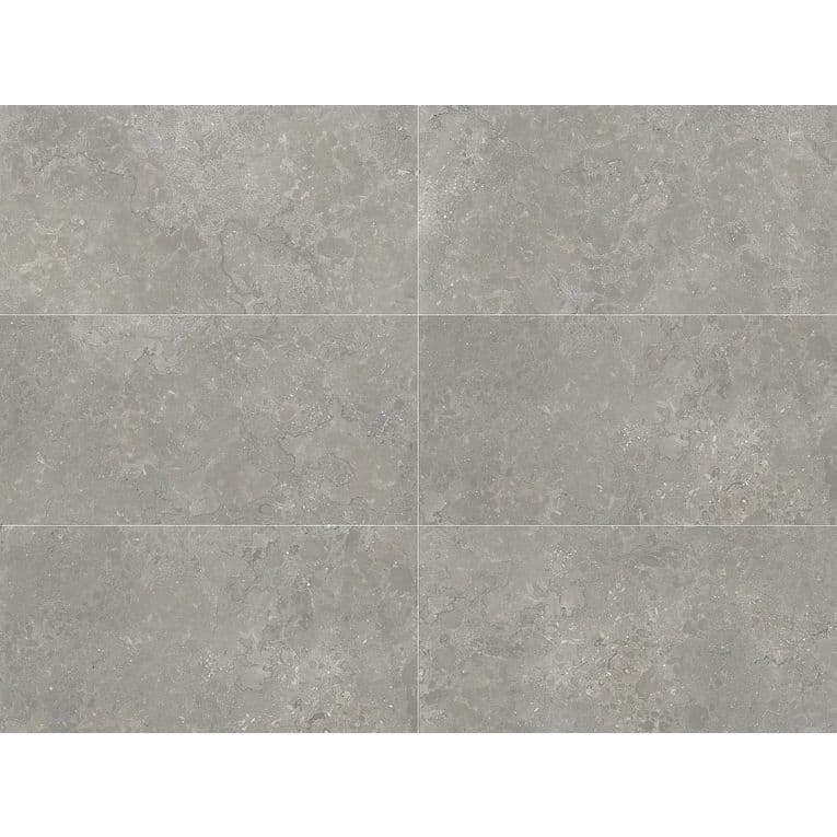 A gray tile floor with some white spots on it