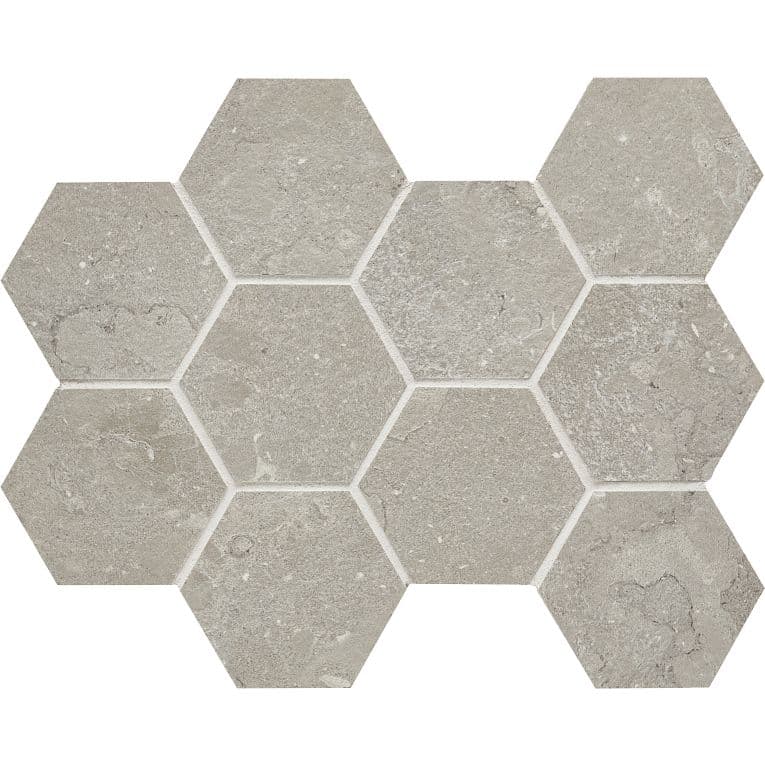 A gray hexagonal tile floor with white grout.