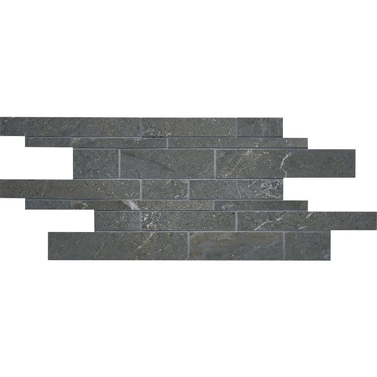 A black stone wall with a strip of white and gray marble.