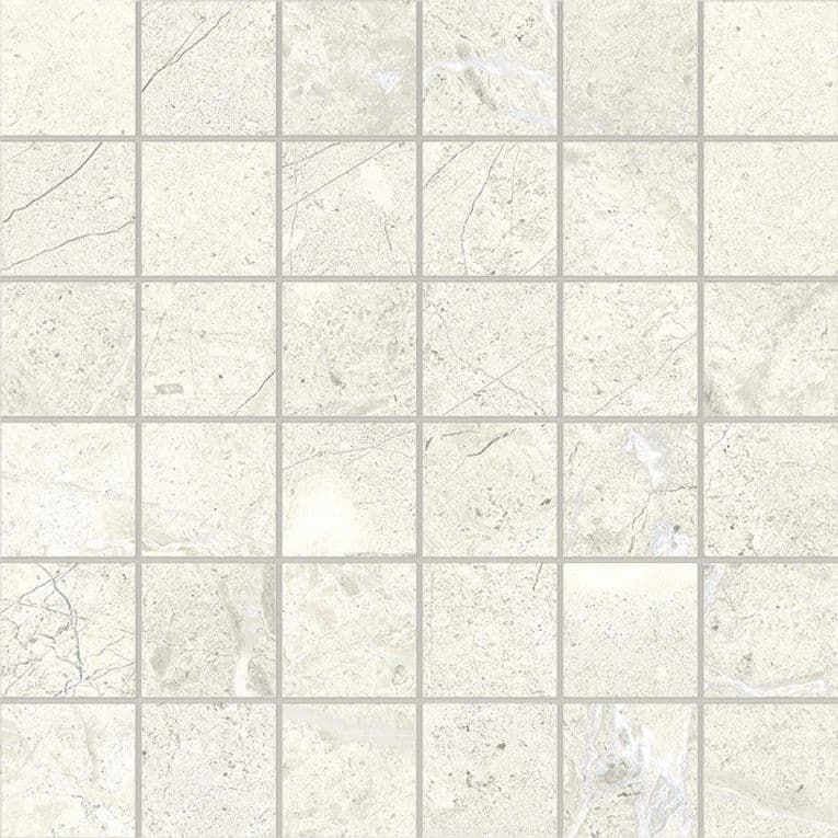 A white tile floor with some small squares