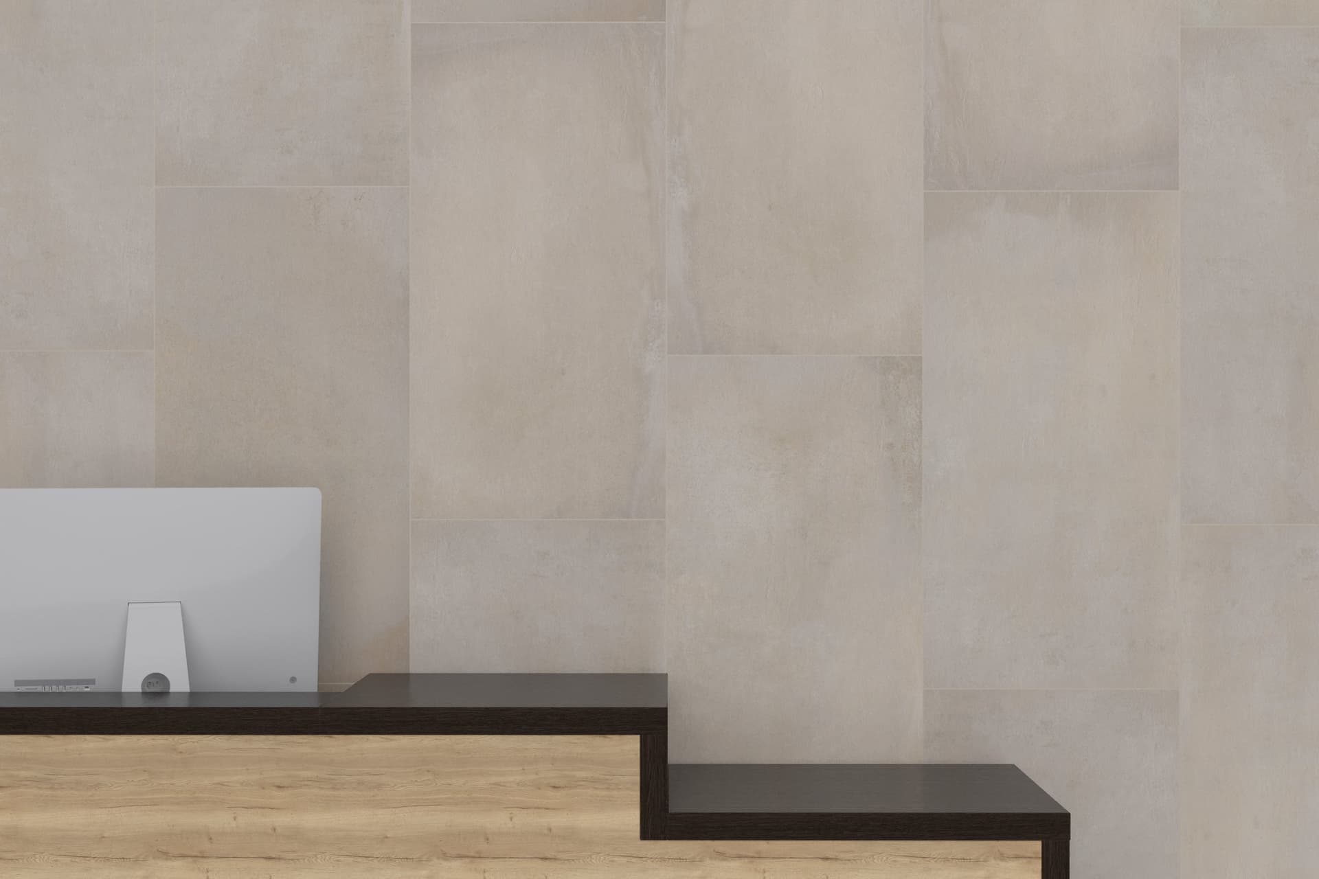 A wall with some steps and a laptop on top of it