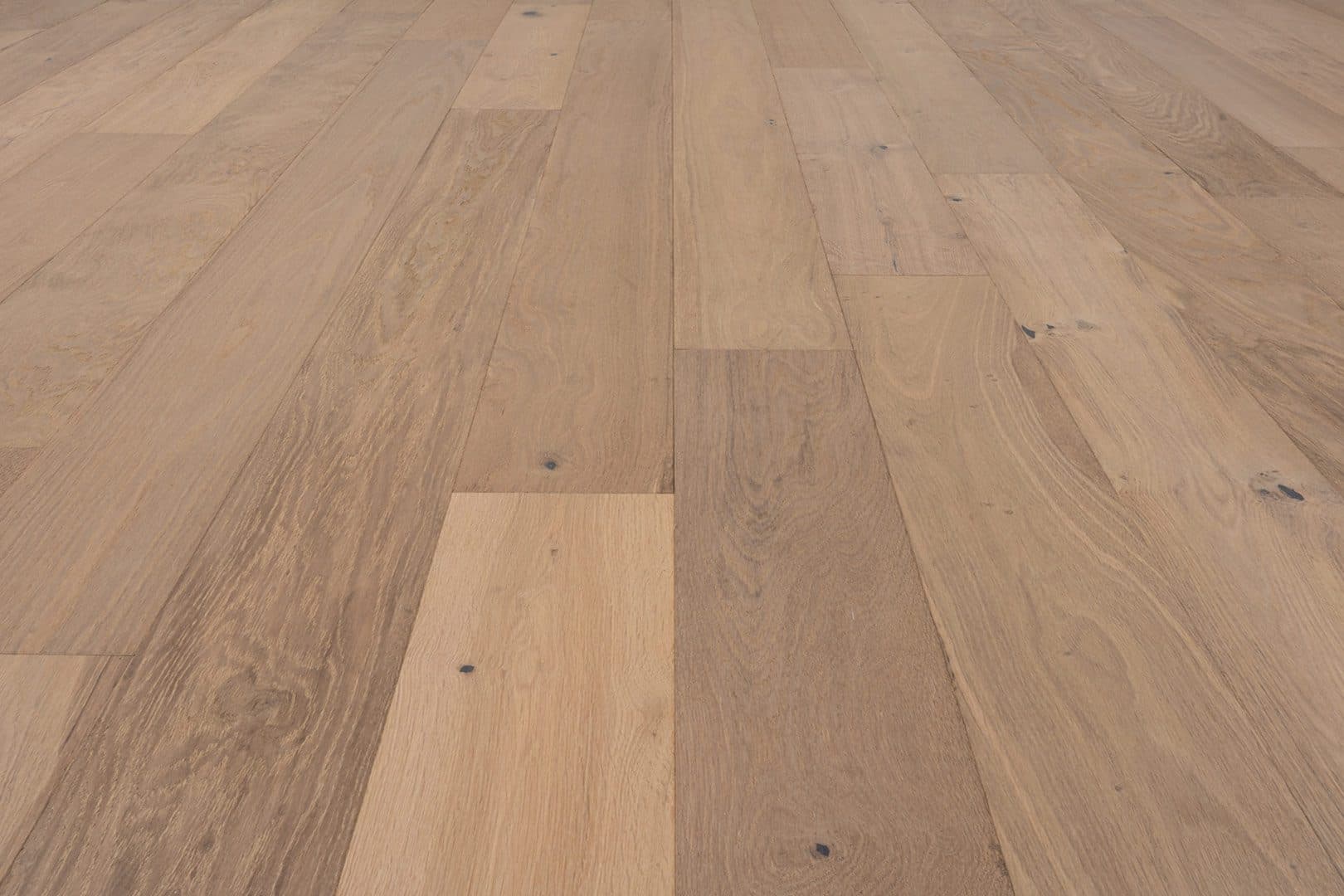 A close up of the wood grain on the floor.