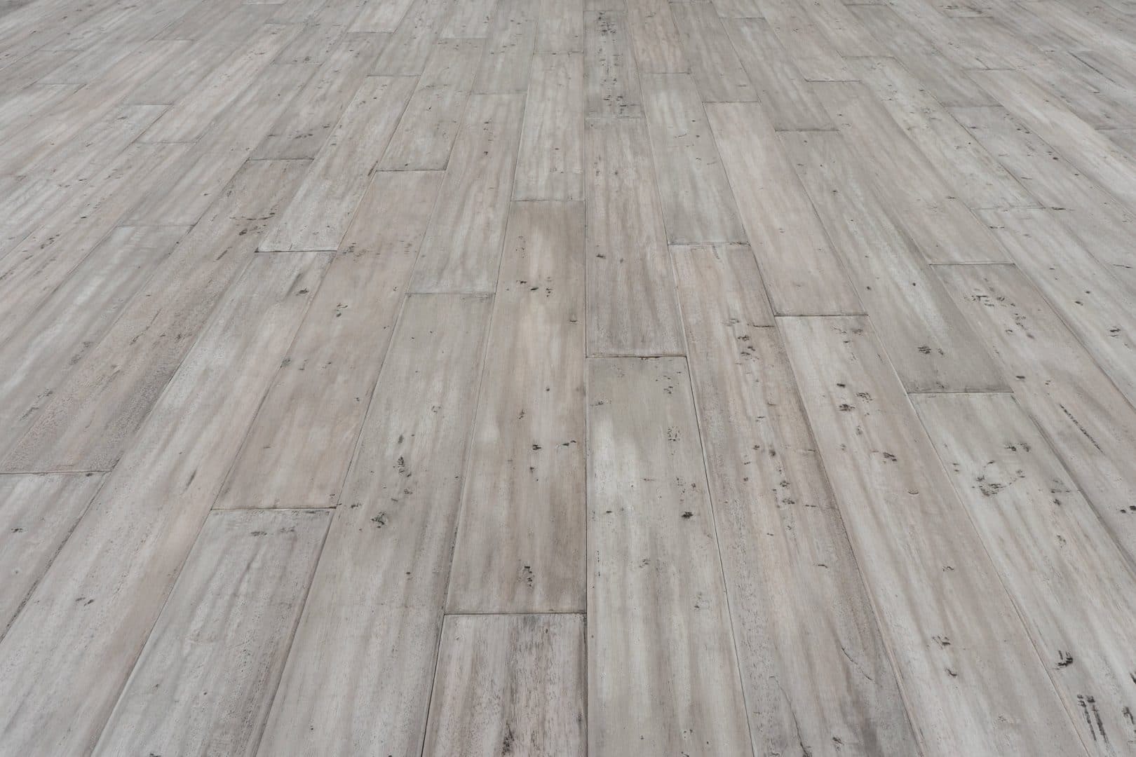 A wooden floor with some wood planks on it