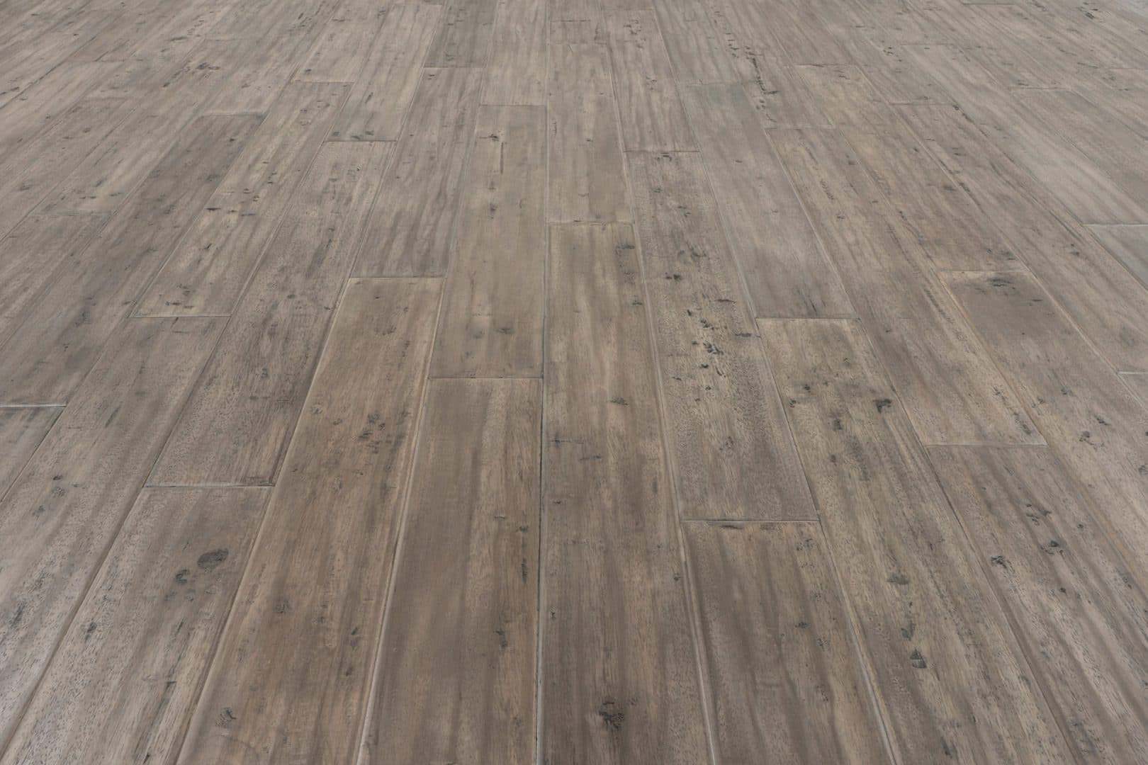 A close up of the floor of an empty room