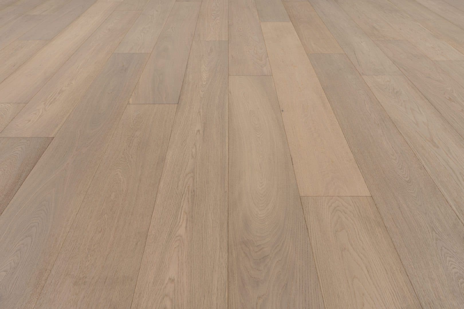A close up of the wood floor with no one around.
