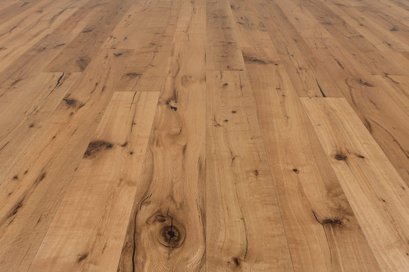 A close up of the wood grain on the floor.
