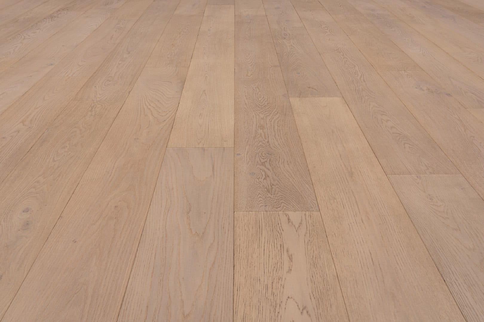 A close up of the wood floor with no one around.