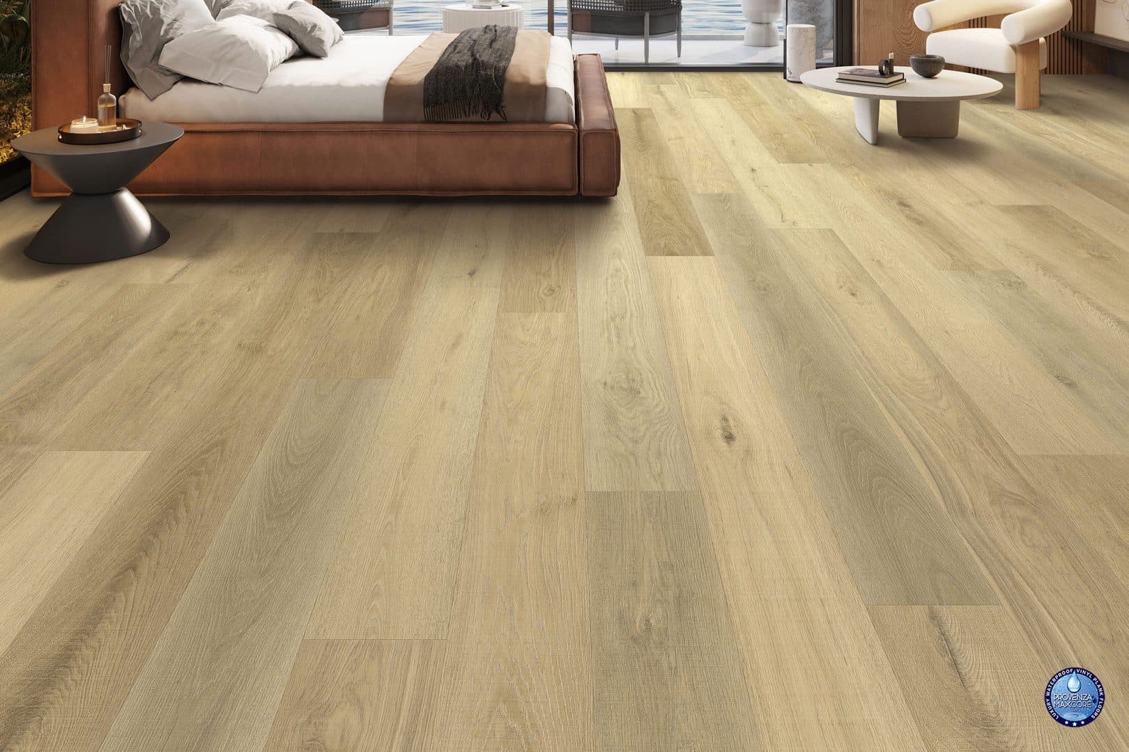 A bedroom with hard wood floors and a bed.