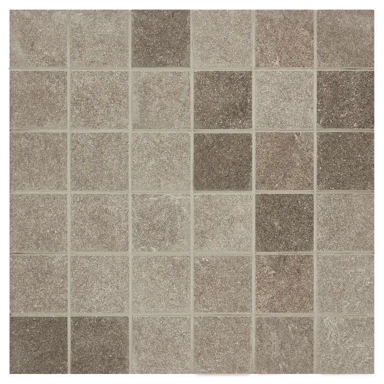 A tile floor with different colors of tiles